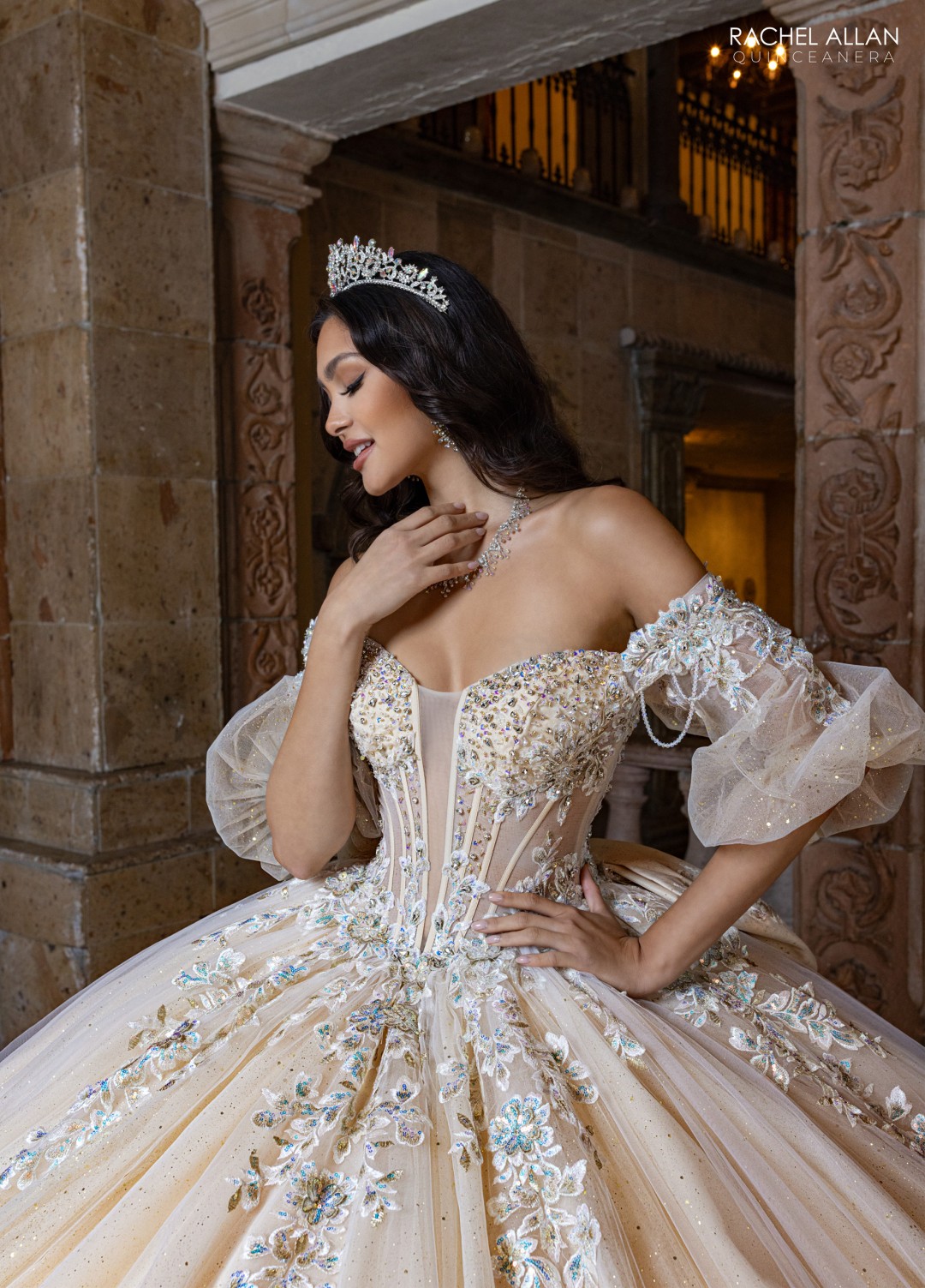 Mint green quinceañera gown with 3D floral accents, corset top, and sparkle organza skirt